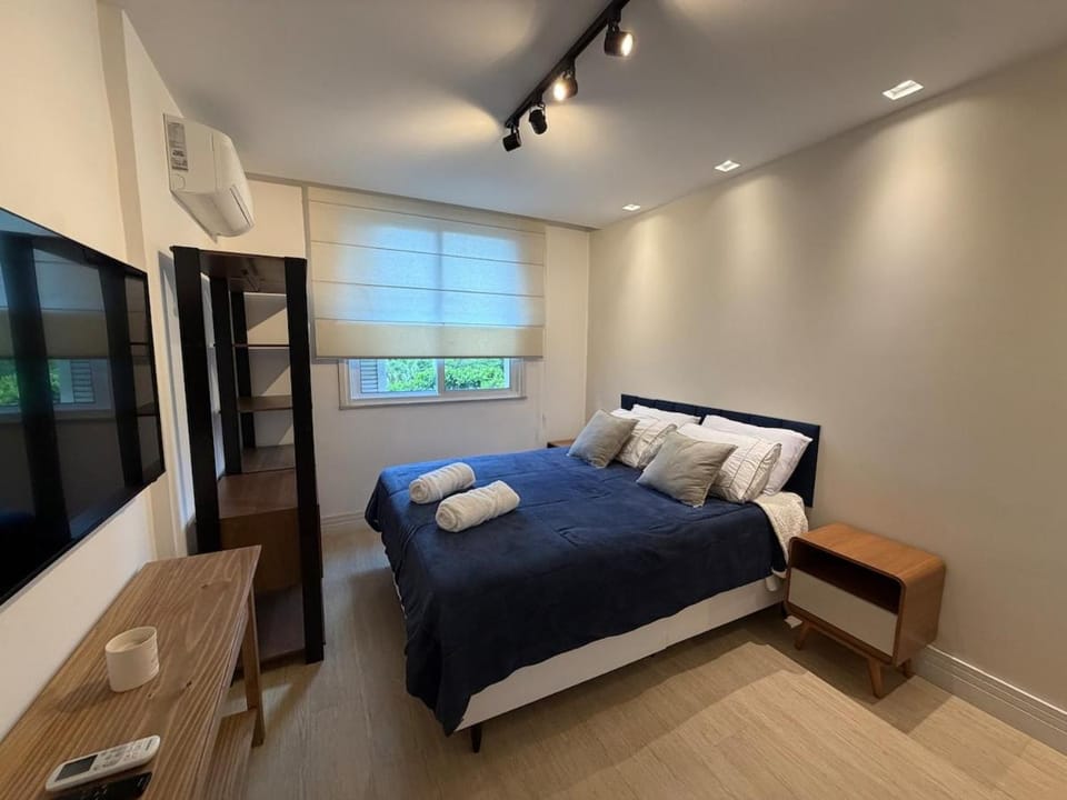 Bed, Photo of the whole room, Bedroom, towels, air conditioner