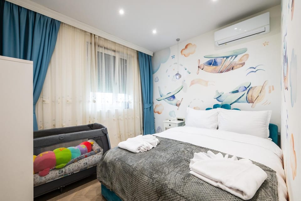 Bed, Bedroom, cot, towels, air conditioner