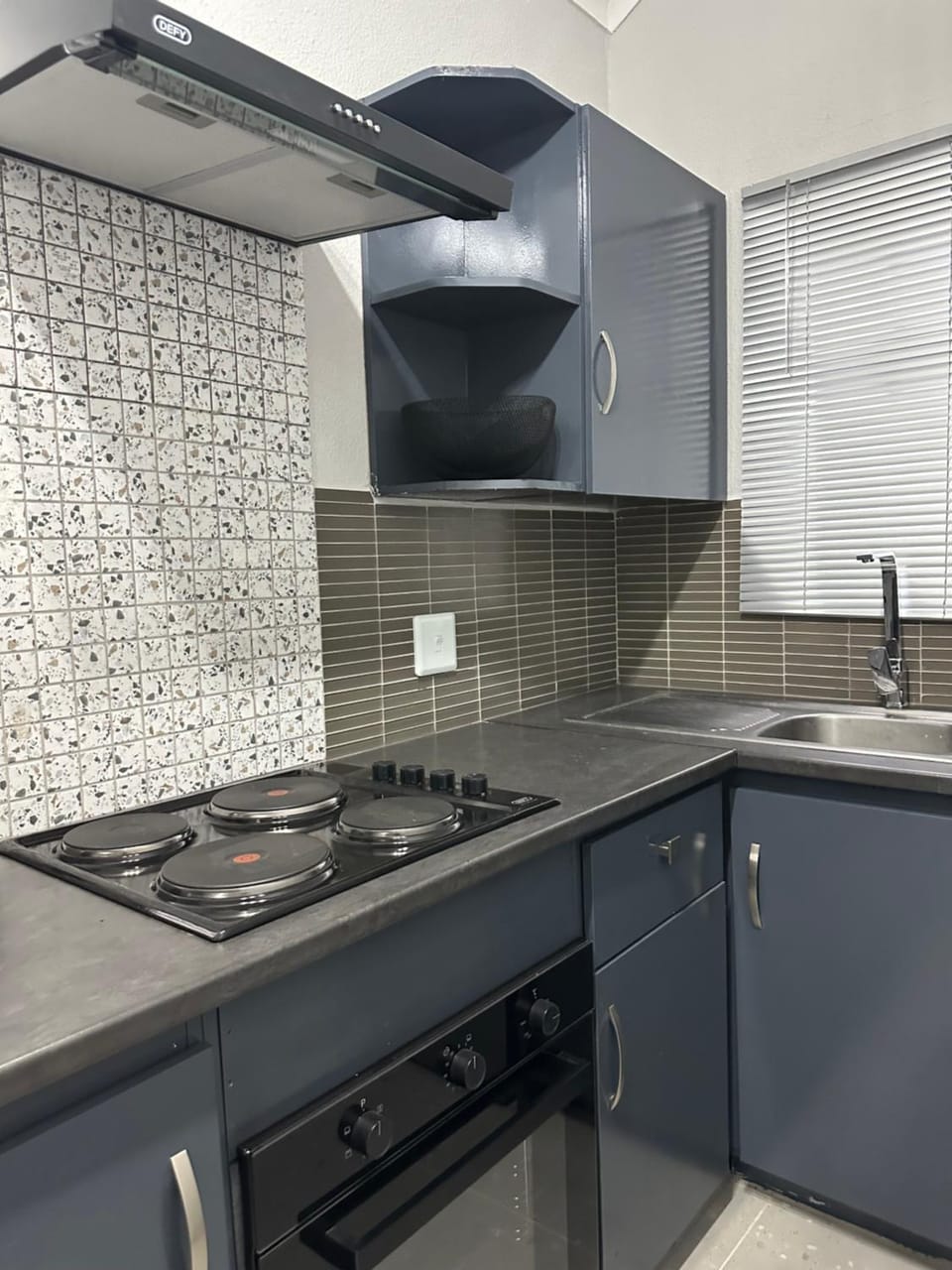Kitchen or kitchenette, stove