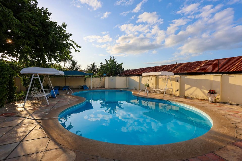 Patio, Day, Natural landscape, Pool view, Swimming pool, sunbed