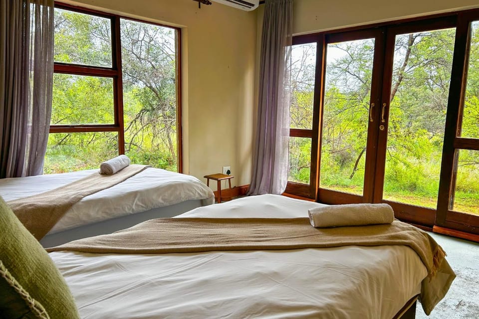 Bed, View (from property/room), View (from property/room), Bedroom, towels, towels, air conditioner, air conditioner
