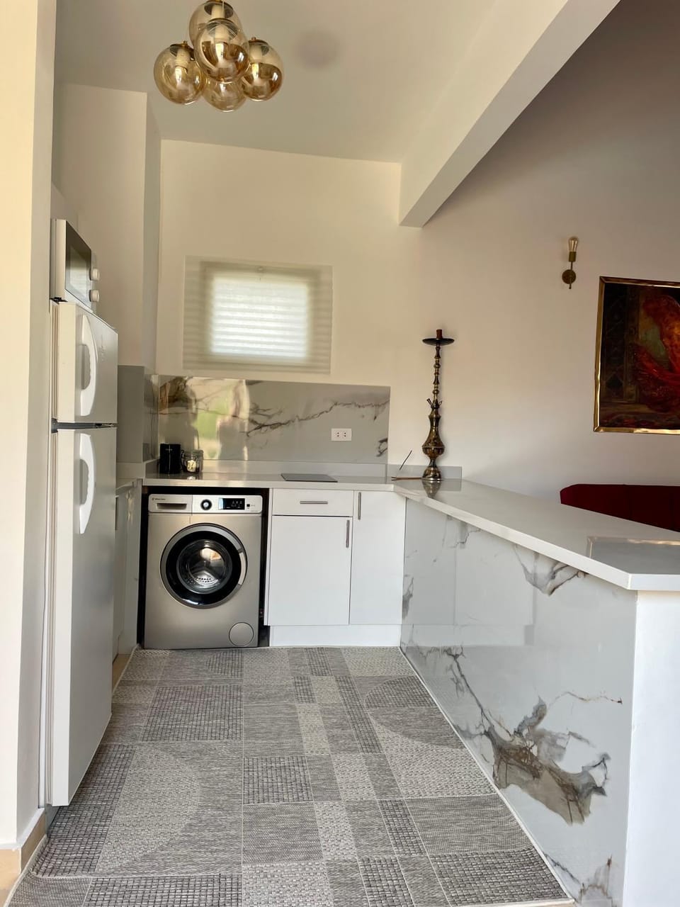Kitchen or kitchenette, washing machine