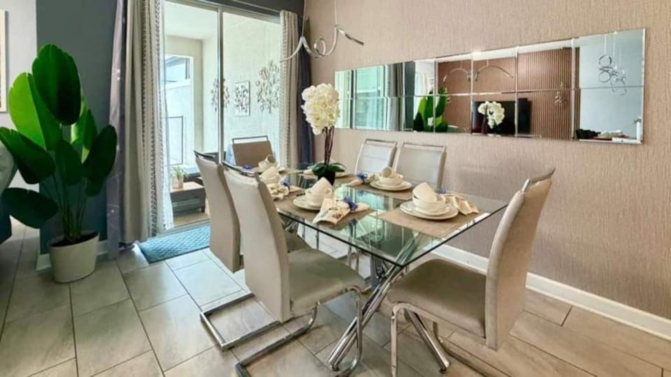 Modern Oasis at Storey Lake w 4BR & Heated Pool House in Kissimmee