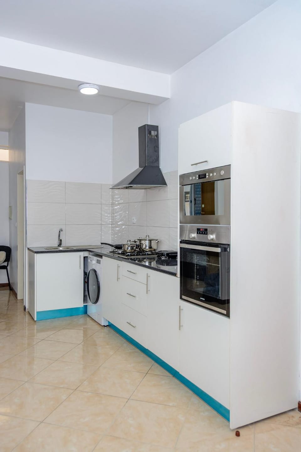 Kitchen or kitchenette, dishwasher, oven, stove, toaster