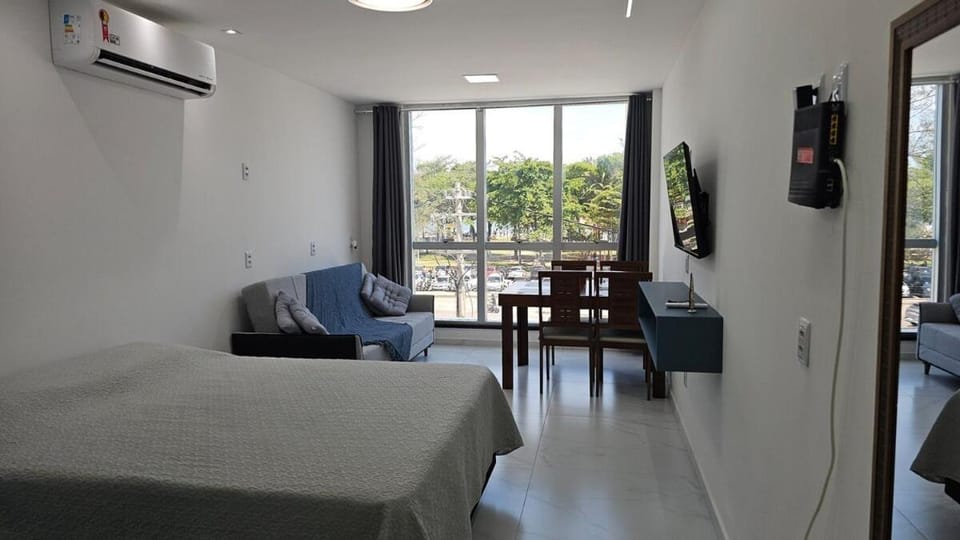 TV and multimedia, View (from property/room), Living room, Seating area, Dining area, air conditioner