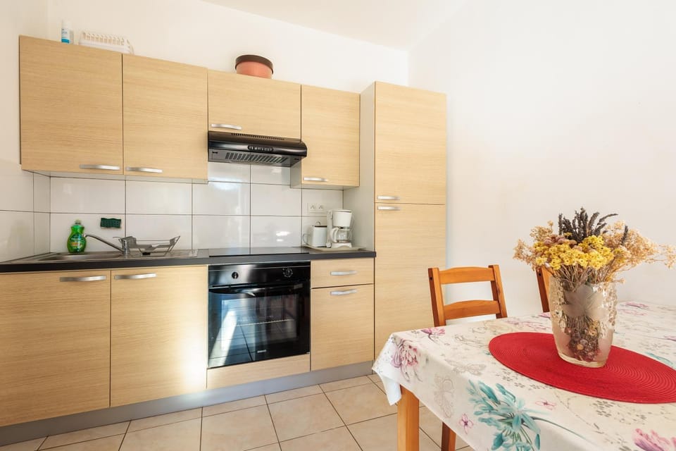 Kitchen or kitchenette, stove