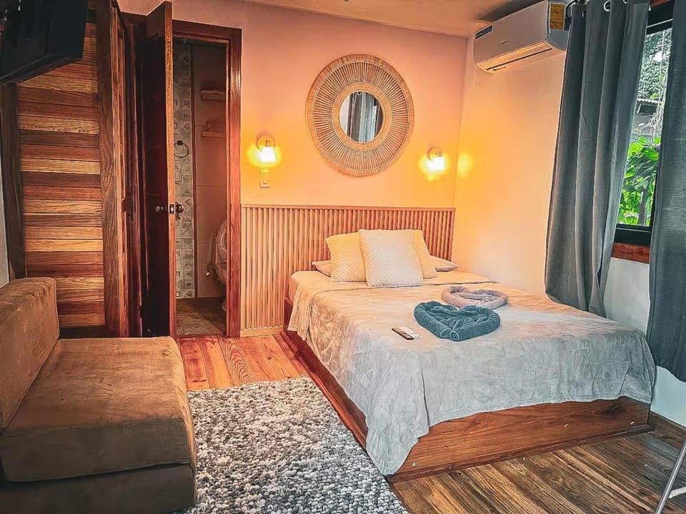 Bed, Photo of the whole room, Bedroom, towels, air conditioner