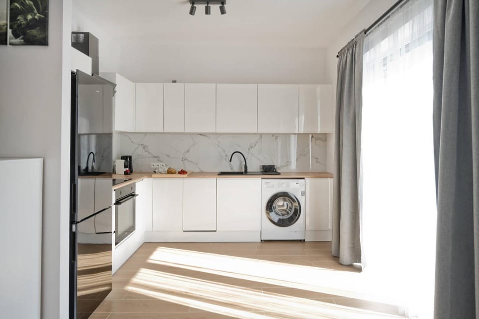 Kitchen or kitchenette, washing machine