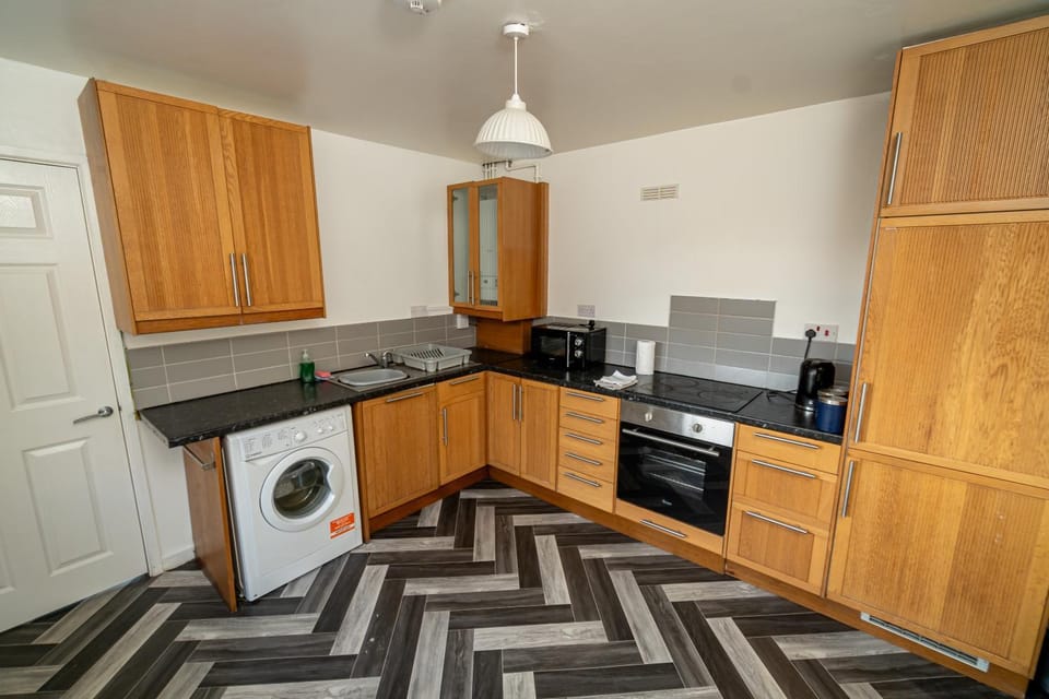 Coffee/tea facilities, Kitchen or kitchenette, dishwasher, oven, stove, toaster, washing machine