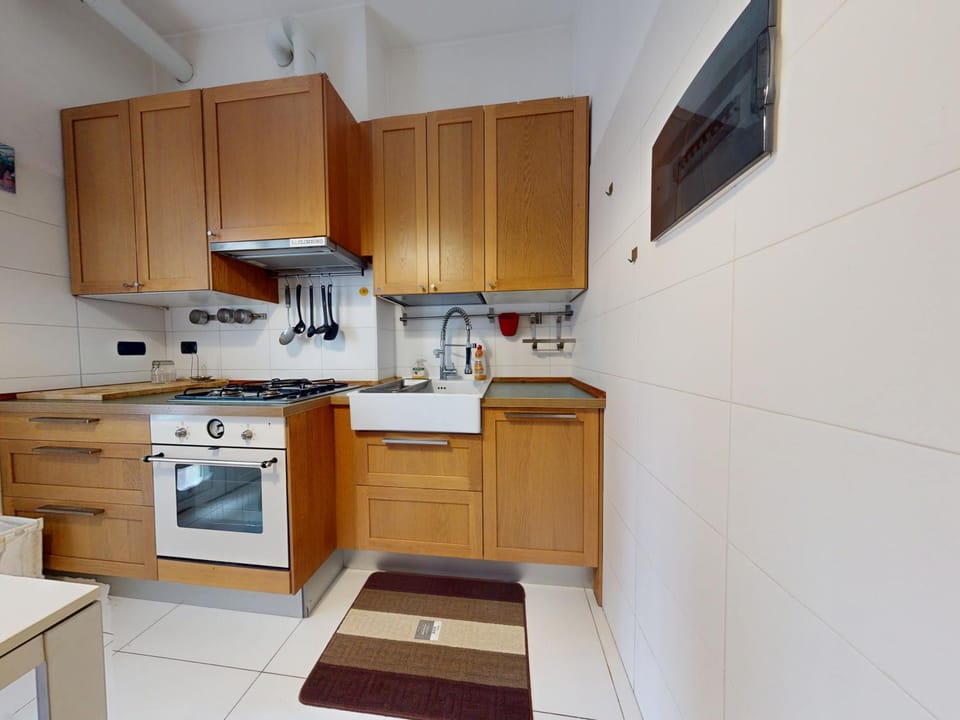 Kitchen or kitchenette, oven, stove