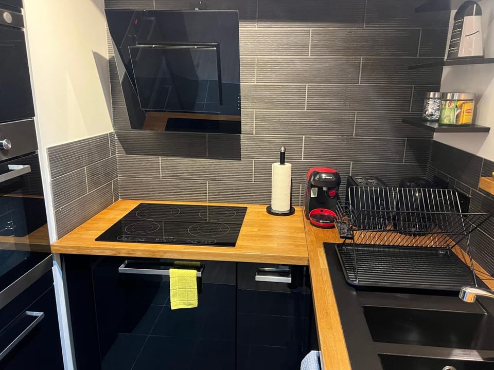 Kitchen or kitchenette, stove, toaster