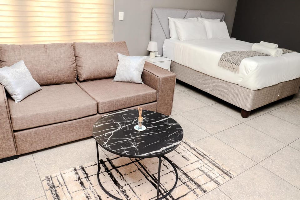 Bed, Living room, Photo of the whole room, Seating area, Bedroom