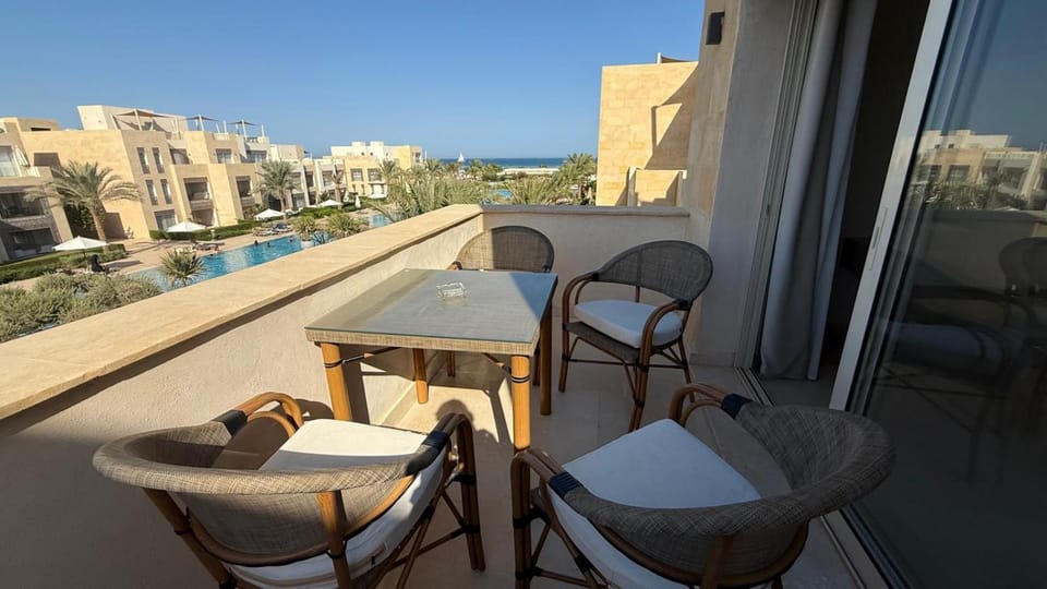 Property building, Patio, Natural landscape, View (from property/room), Balcony/Terrace, Seating area, Dining area, Sea view
