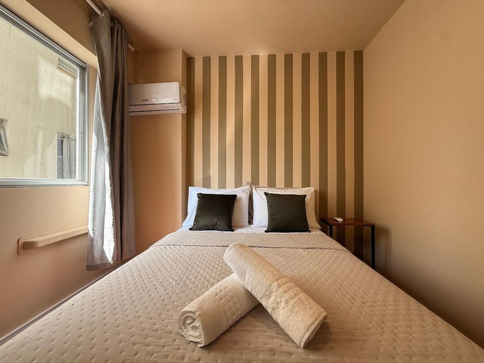 Bed, Photo of the whole room, Bedroom, towels, air conditioner