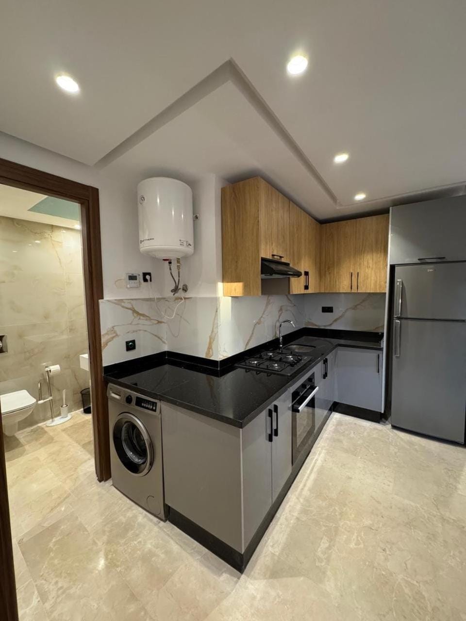 Kitchen or kitchenette, washing machine