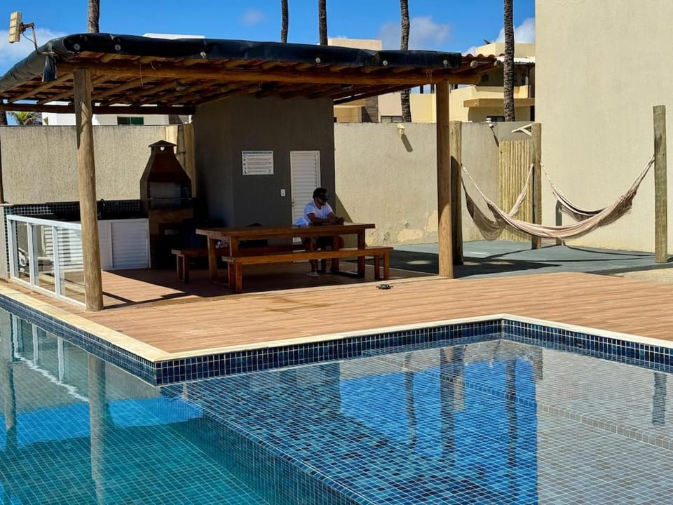 Swimming pool, sunbed