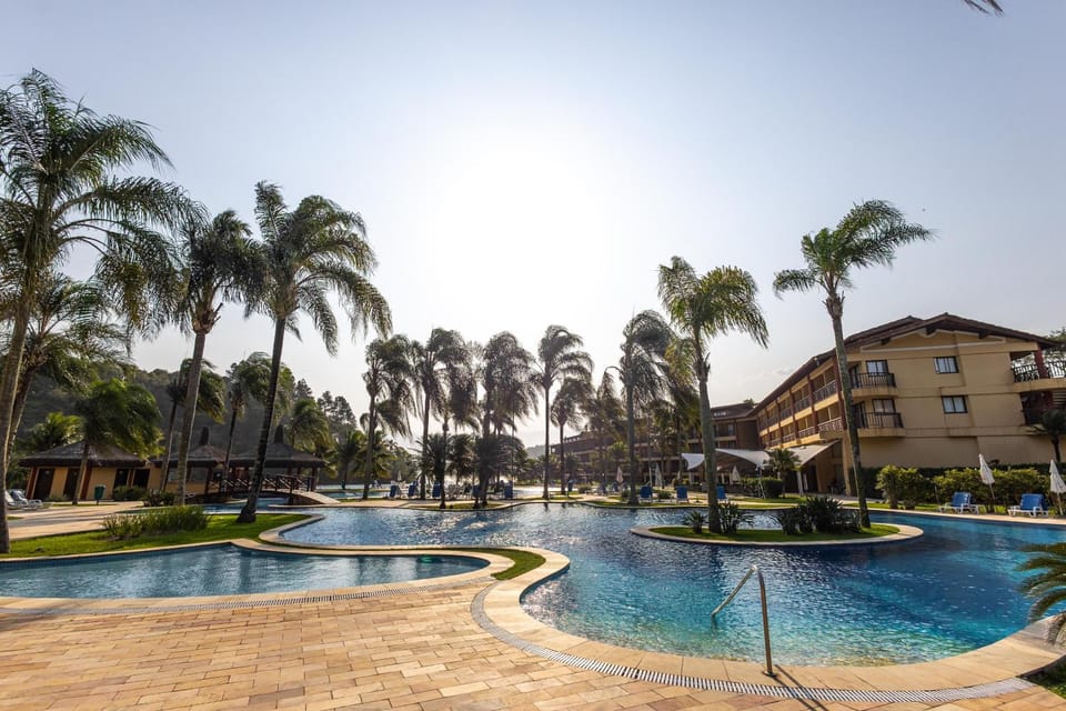 Property building, Day, Pool view, Swimming pool, sunbed