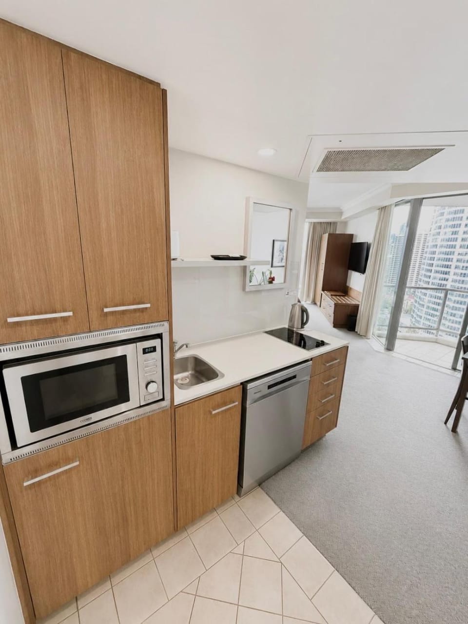 Kitchen or kitchenette, dishwasher, stove, toaster