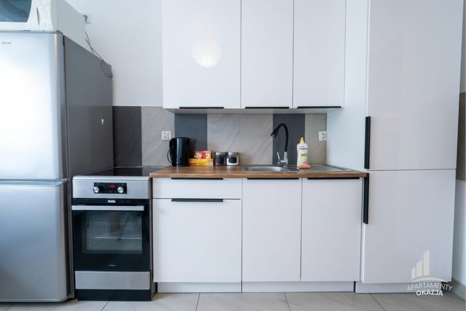 Apartament #PODGÓRSKA, FV Parking Balkon by APARTAMENTY OKAZJA Apartment in Poland