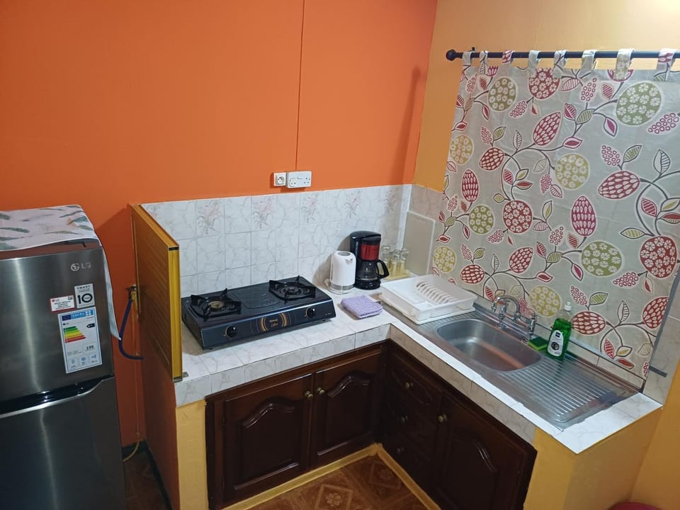 Kitchen or kitchenette, stove