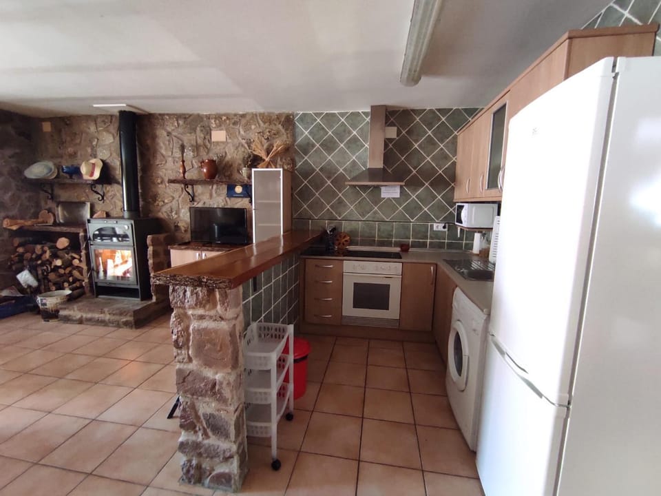Kitchen or kitchenette, oven, stove