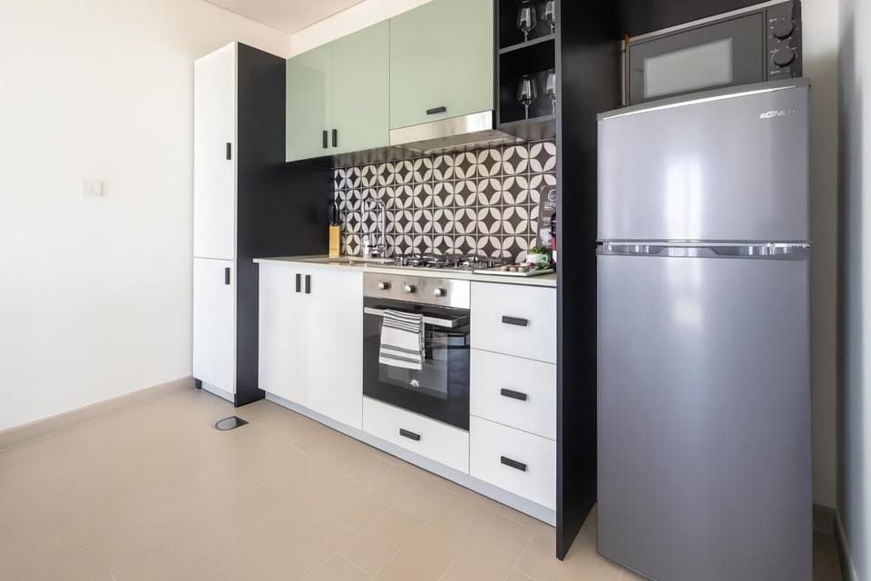 Kitchen or kitchenette, oven, stove