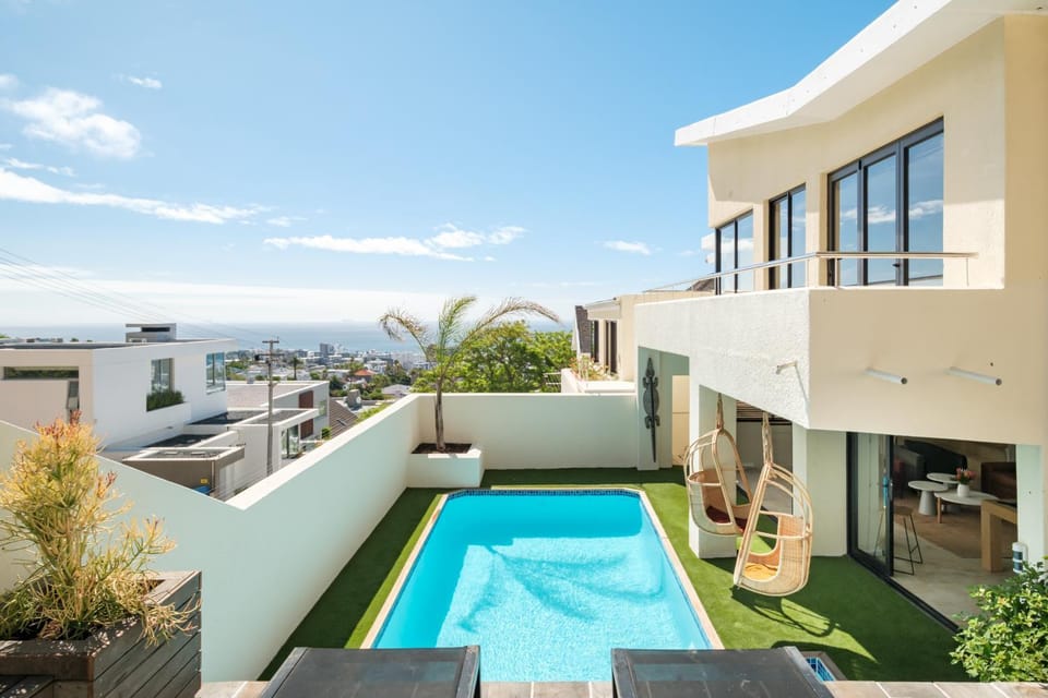 Property building, Patio, Day, Natural landscape, View (from property/room), Balcony/Terrace, Pool view, Sea view, Swimming pool, sunbed