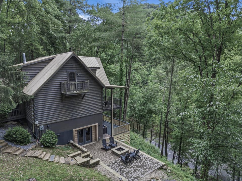 Riverfront Family Retreat that Sleeps 10 with Water Views & Hot Tub House in Sevier County
