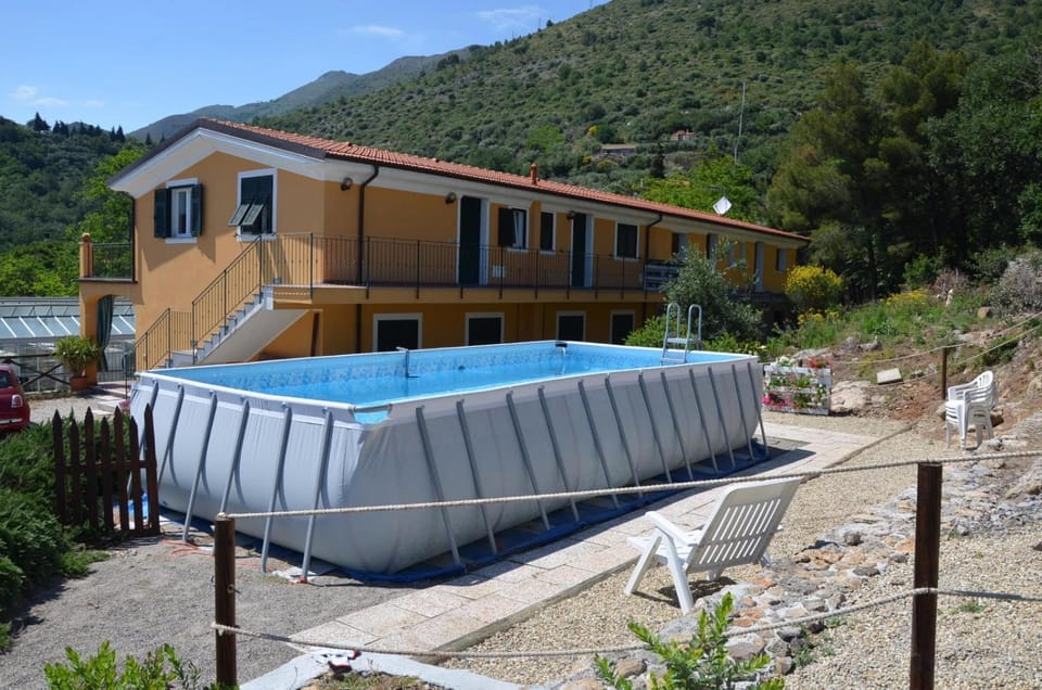 Property building, Living room, Swimming pool