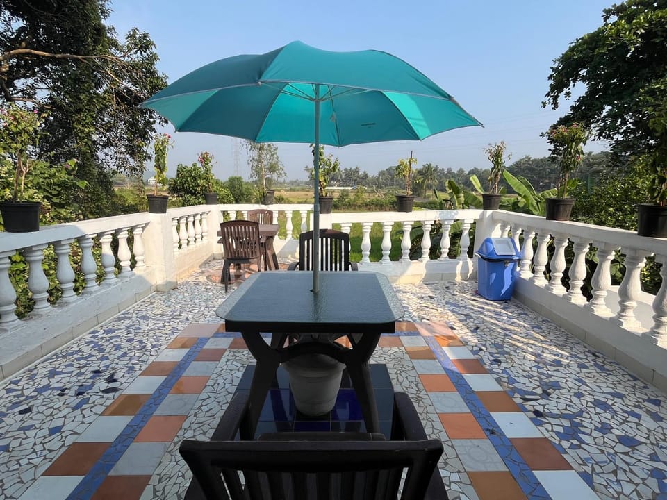 Indigo Orchid Homestay - A spacious, serene villa with terrace and farm view House in Calangute