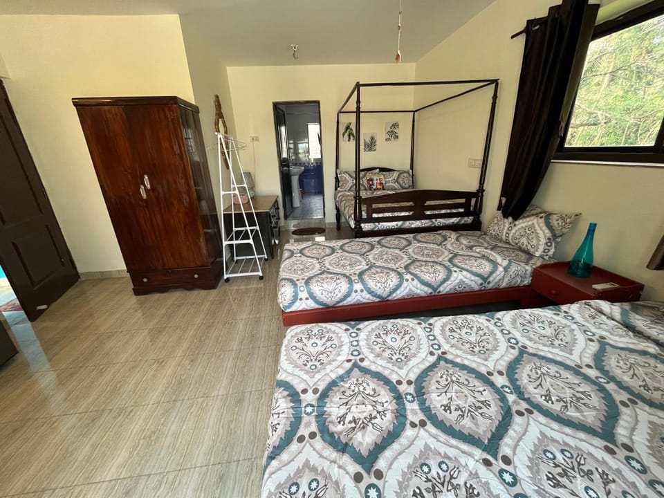 Indigo Orchid Homestay - A spacious, serene villa with terrace and farm view House in Calangute