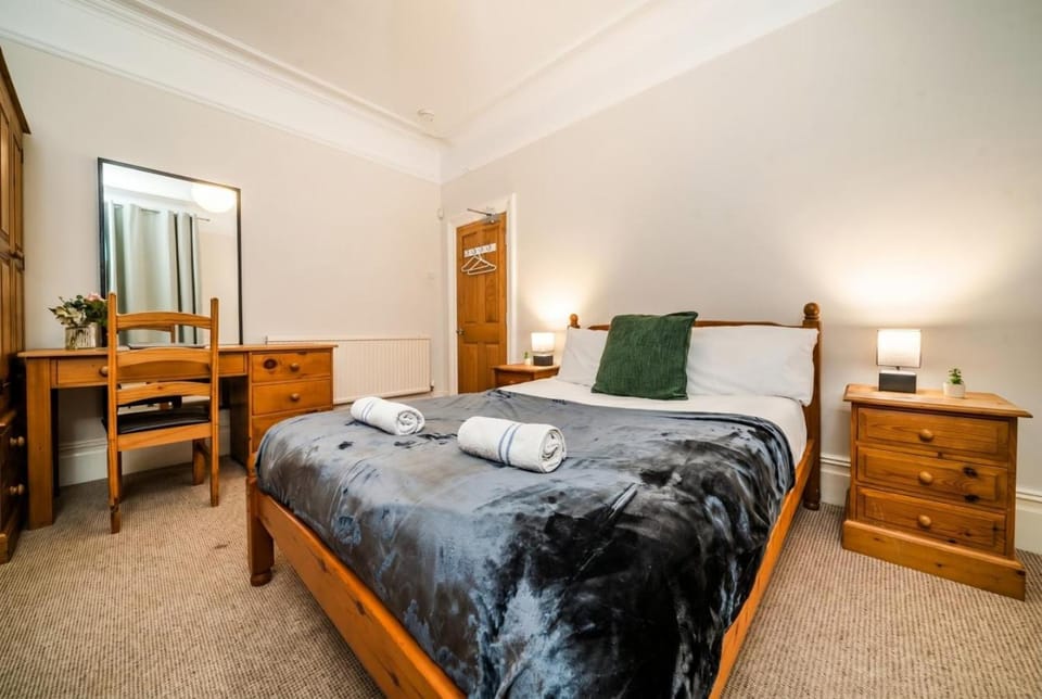 Bed, Seating area, Bedroom, towels, wardrobe