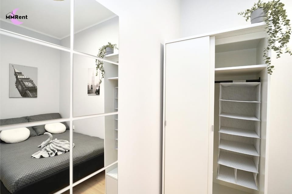 Bed, towels, wardrobe