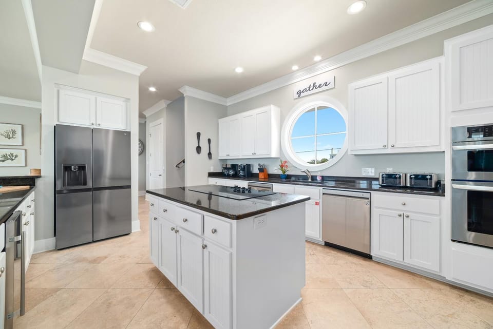 Kitchen or kitchenette, dishwasher, oven, stove, toaster