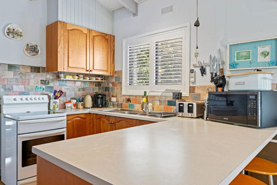 Kitchen or kitchenette, microwave