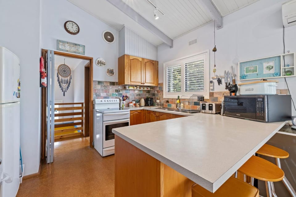 Kitchen or kitchenette, oven, stove, toaster