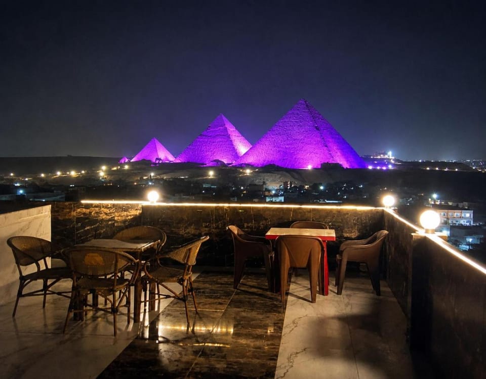 Night, View (from property/room), Seating area, Landmark view, Mountain view