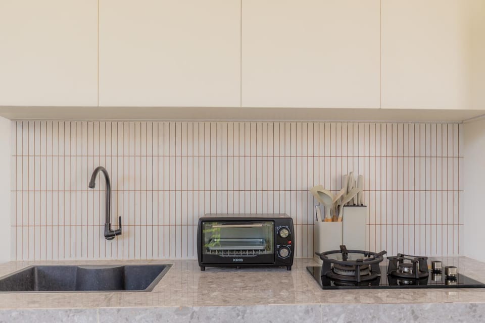 Kitchen or kitchenette, microwave, stove, kitchen