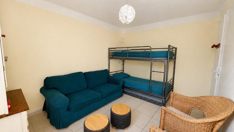 Night, Library, Living room, Photo of the whole room, Seating area, Bedroom, bunk bed, furniture, heating, storage, towels