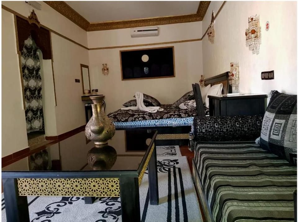Bed, Living room, Seating area, Bedroom
