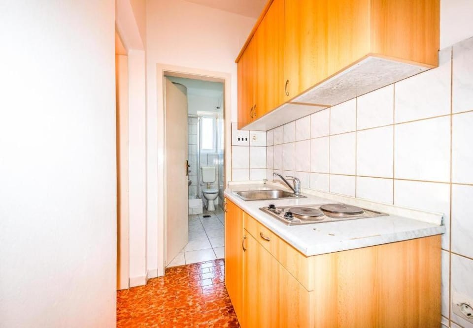 Kitchen or kitchenette, stove