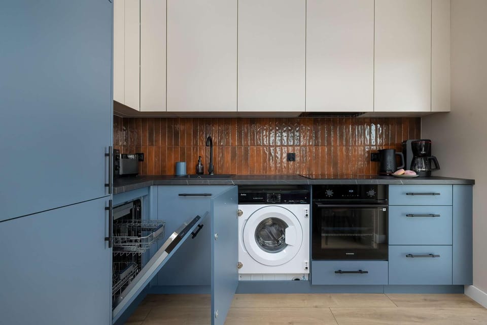 Kitchen or kitchenette, washing machine