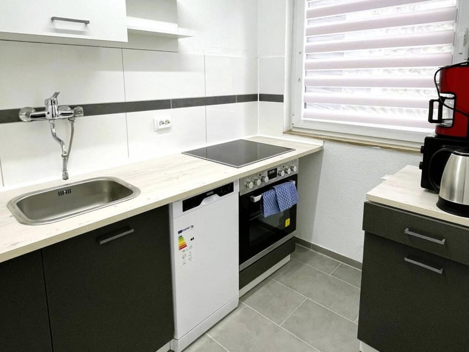 Kitchen or kitchenette, stove