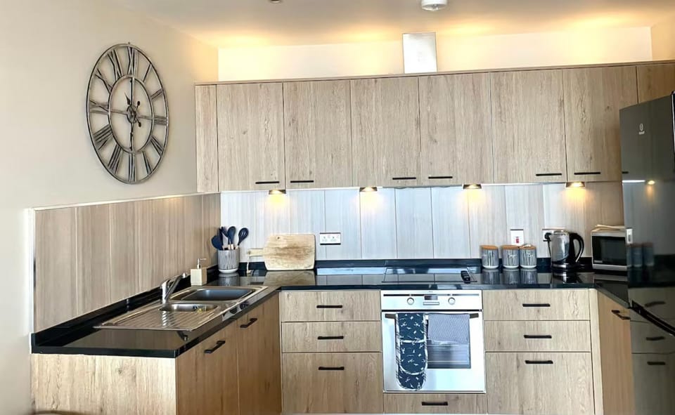 Kitchen or kitchenette, furniture, minibar, oven, stove