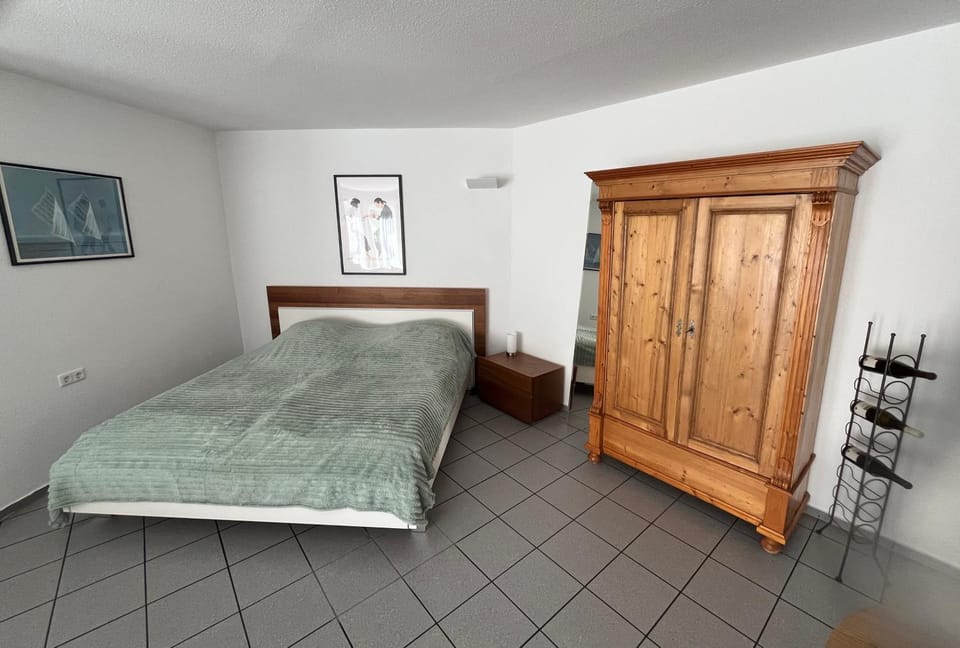 Bed, wardrobe