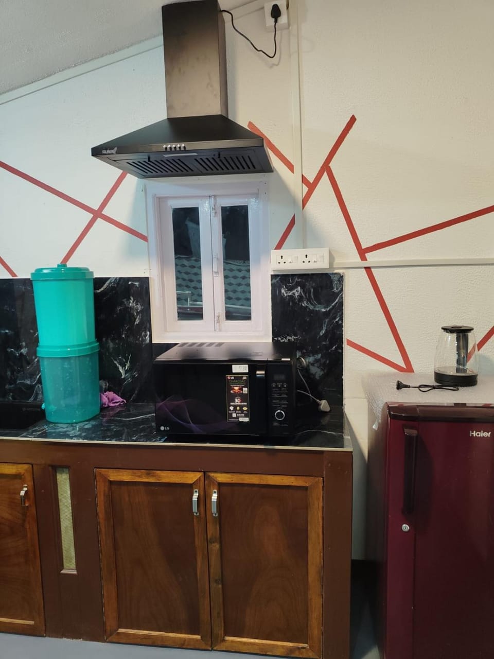 Kitchen or kitchenette, stove, toaster