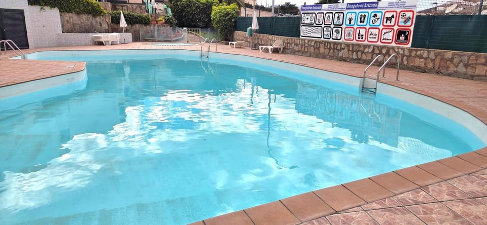 Property building, Living room, Swimming pool