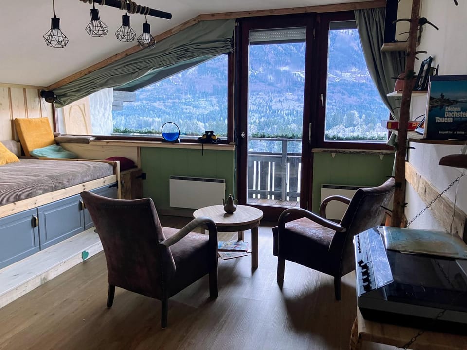 Natural landscape, Living room, Seating area, Mountain view