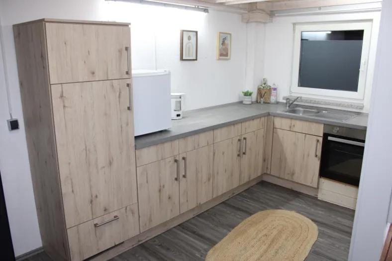 Kitchen or kitchenette, oven, stove