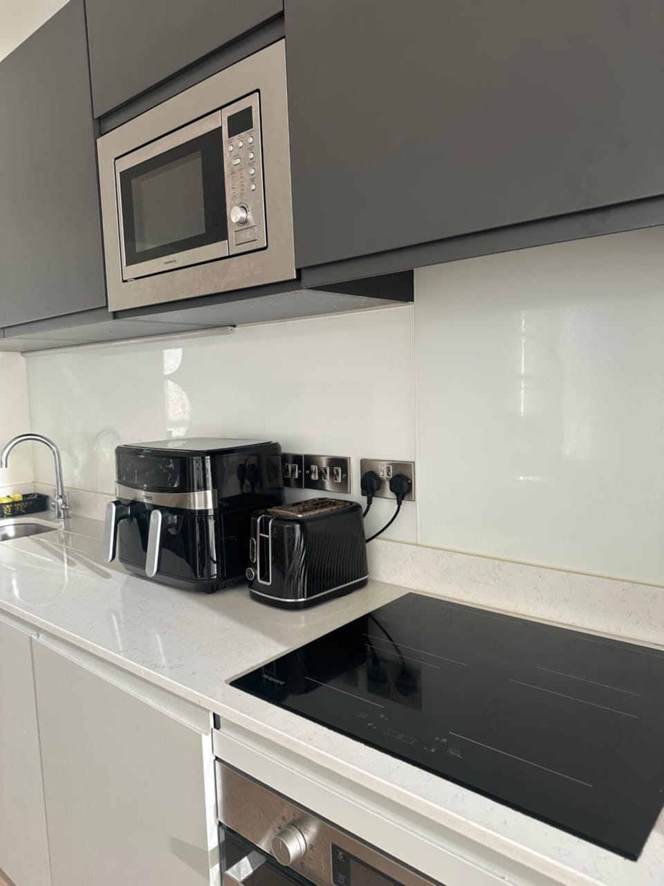 Kitchen or kitchenette, stove, toaster